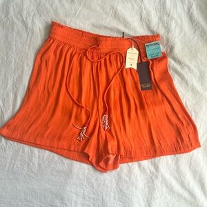 Orange Rachel Roy resort shorts with beaded detail